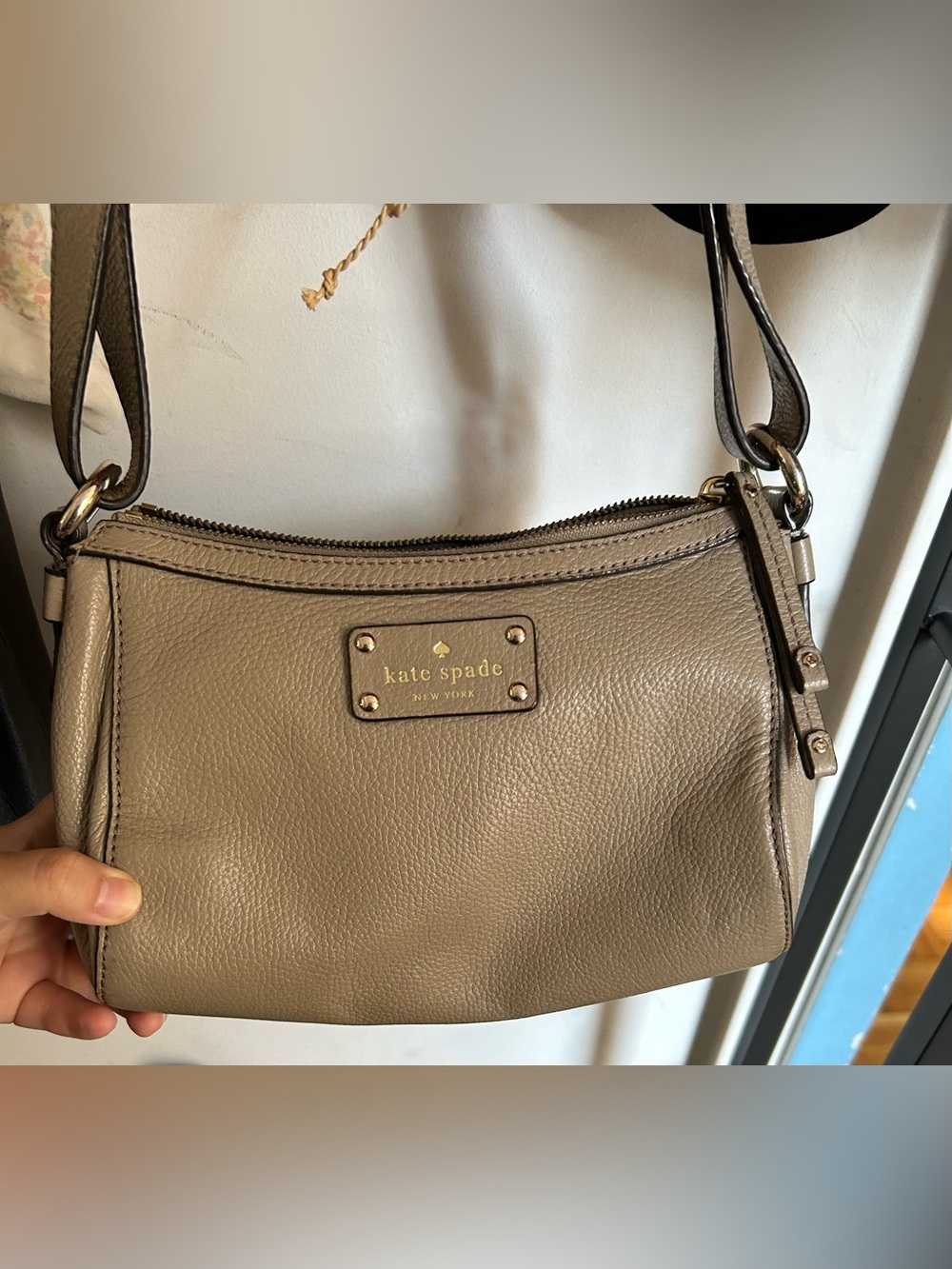kate spade taupe leather shoulder hobo with gold logo plate